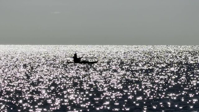 Kayaker Silhouette on the Ocean at Sunset on Cape Cod