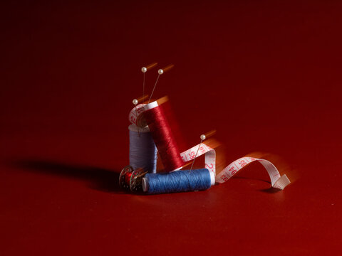 Sewing Supplies Still Life a red surface