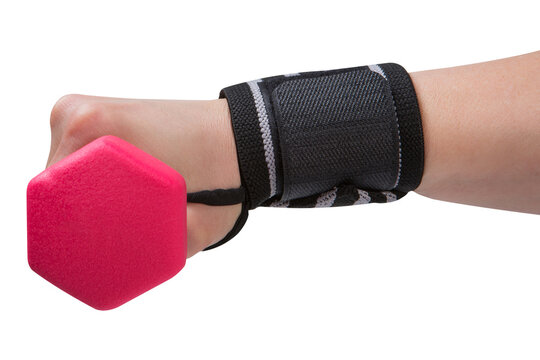 Hand holding pink dumbbell with black wrist support wrap isolated on white background