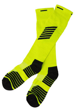 Pair of neon green and black football knee high socks isolated on white background