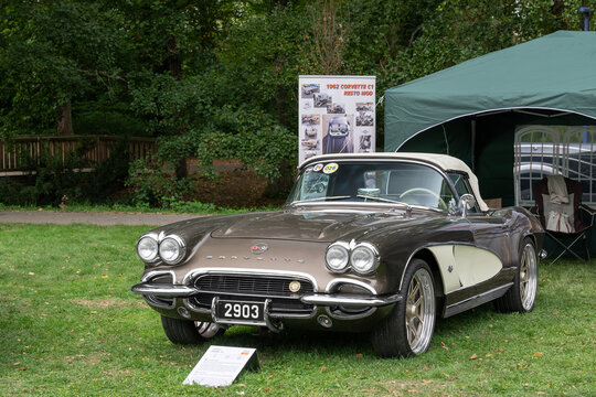 Mondorf-les-Bains, Luxembourg - September 13th 2026 : View on a brown Chevrolet Corvette C1 from 1962 parked on a lawn.