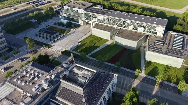 High angle drone perspective of modern business district and office complex