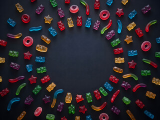 Obraz premium Colorful LEGO Bricks and Pieces Arranged in Circular Pattern.