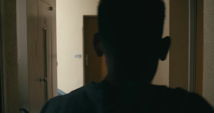 Cinematic shot door opening revealing neighbor door and man walking
