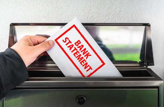 Hand Mailing Bank Statement in Envelope