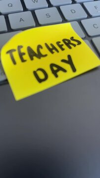 Teachers day sticky note on laptop keyboard online education