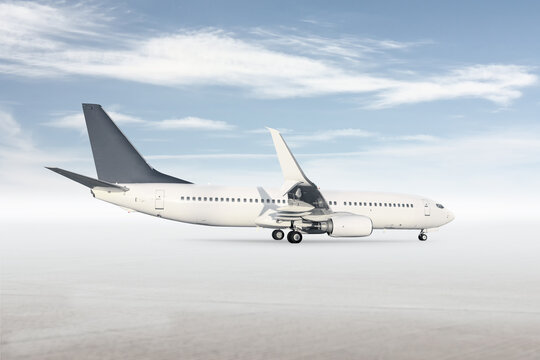 Passenger airplane isolated on bright background with sky
