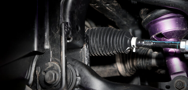Car suspension and drive shaft. Structure of EV car spare parts. Such as Front or Rear suspension Shock absorber suspension Brake. Elements of the suspension and Chassis structure. Car service repair.