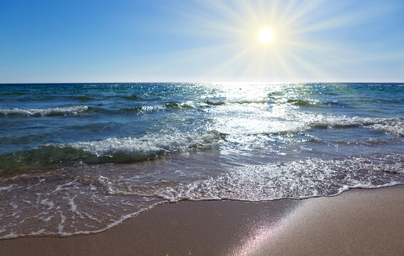 Sun beach with blue sky and turquoise water,as holiday summer background.