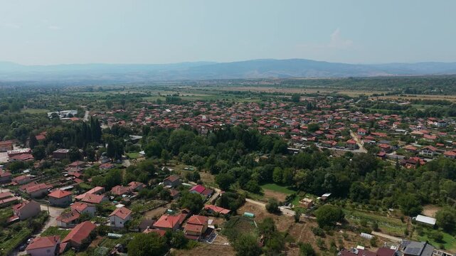 Aerial drone view over Stob village in Bulgaria with red tile roofs