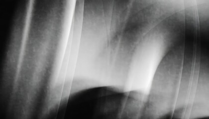 Obraz premium Abstract grayscale background with blurred motion and indistinct human form