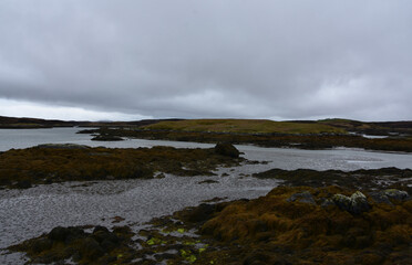 Obraz premium Dramatic Clouded Skies Over Remote Outer Hebrides Landscape