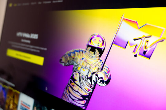 Mexico city, mexico, 10 20 2025: mtv vmas moon person astronaut holding flag on screen