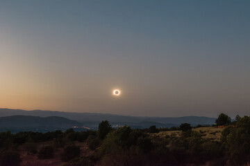 Total Solar Eclipse Ring over Twilight Landscape © Raul