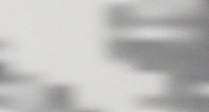 Expansive gray texture featuring prominent soft shadows across the surface adding dramatic visual depth