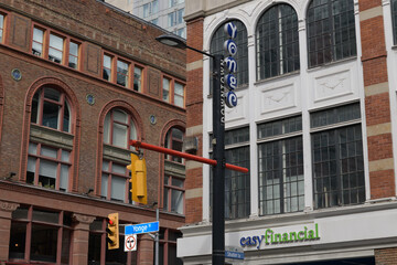 Obraz premium exterior of historic Ryrie Building and John E. Thompson Block, location of easyfinancial Services, a loan agency, located at 221 Yonge St, Toronto