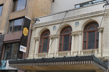 Obraz premium facade with arched windows and canopy of Elgin & Winter Garden Theatres designed by Thomas W Lamb et al, located at 189 Yonge St, Toronto