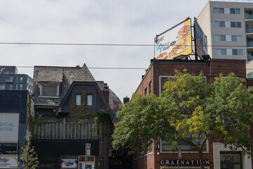 Obraz premium rooftop billboard on building at 204 Spadina Av (location of Graination, a photo lab) and other businesses, Toronto