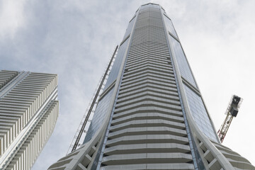 Obraz premium (at left edge) The Prestige and an upward view of SkyTower at Pinnacle One Yonge, Toronto