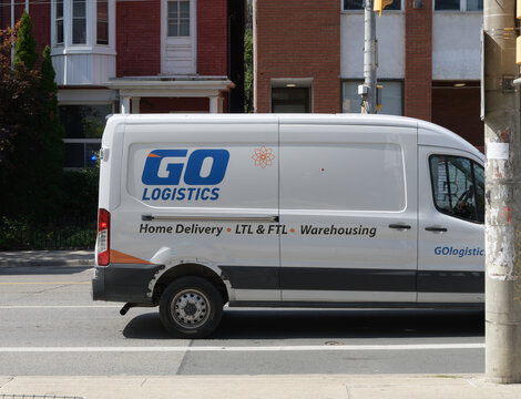 exterior side of GO Logistics Inc 3PL and delivery company vehicle heading north on Beverley St, south of Dundas St W, Toronto