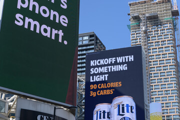 Obraz premium large-format spectacular with advertising for alcohol (Miller Lite) facing Sankofa Square, Toronto