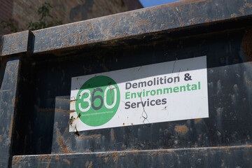 Obraz premium sticker sign of 360 Demolition & Environmental Services on the side of a roll-off bin/container at Evergreen Brick Works, Toronto
