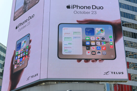 large-format rooftop digital spectacular with advertising by Apple Inc for the upcoming release of the iPhone Duo at Toronto's Sankofa Square