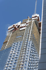 Obraz premium an upward view of Forma Condos designed by Frank Gehry and Mirvish (south-west elevation) King St W, Toronto