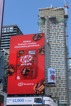 large-format rooftop digital spectacular with advertising by KitKat Mix-Ups (produced by Nestl&eacute;) over 302 Yonge St, Sankofa Square, Toronto