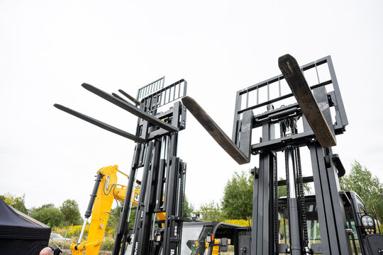 09.11.2026 - Lviv, Ukraine: JCB construction machinery displayed at a construction equipment exhibition, showcasing heavy machinery, excavators and industrial equipment
