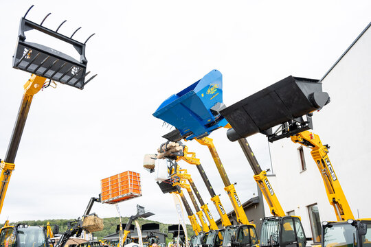 09.11.2026 - Lviv, Ukraine: JCB construction machinery displayed at a construction equipment exhibition, showcasing heavy machinery, excavators and industrial equipment