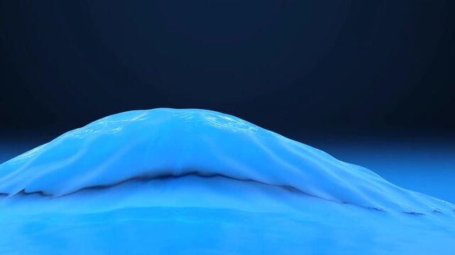 Slow motion tracking dolly close shot of blue wave crest rising and forming over water surface in studio tank set with controlled lighting