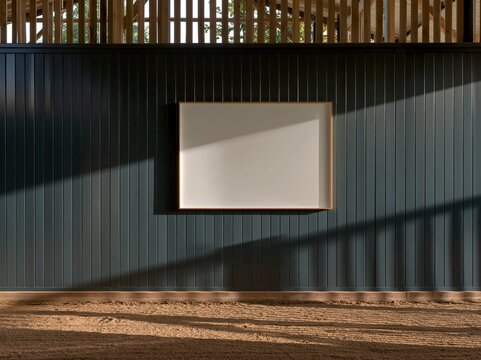 Blank mockup board hanging on a weathered teal blue wooden wall in a rustic equestrian stable for signage and branding copy space