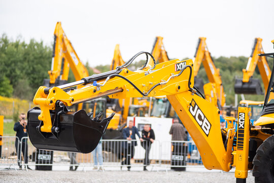 09.11.2026 - Lviv, Ukraine: JCB construction machinery displayed at a construction equipment exhibition, showcasing heavy machinery, excavators and industrial equipment 