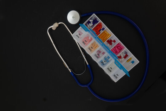 Stethoscope and Pill Organizer Symbolizing Health Care