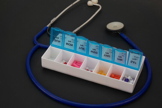 Stethoscope and Pill Organizer Symbolizing Health Care