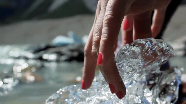 Woman Hand Touching Glacier Ice At Laguna Torre In El Chalten Argentina - 4K
