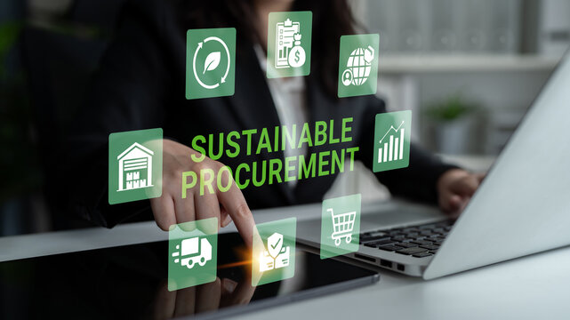 A professional woman interacts with digital sustainability icons in a modern office, emphasizing the importance of sustainable procurement practices in business operations. Ledger