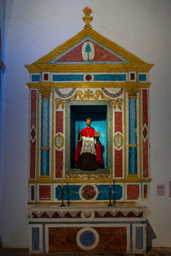Painted baroque altarpiece with the polychrome statue of San Diego de Alcala inside Iglesia de Santa Maria de Betancuria. Fuerteventura, Spain.