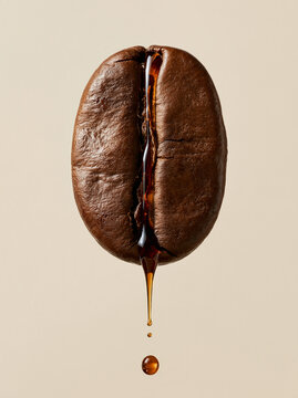 coffee bean floating close up dripping liquid