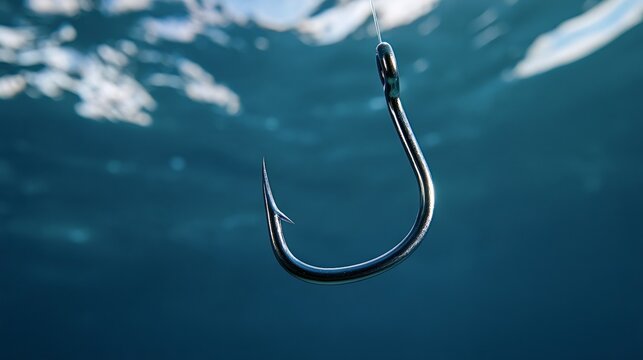 Fishing hook suspended in deep blue ocean water, close up of sharp metal lure suggesting temptation, risk, trap and opportunity beneath the surface
