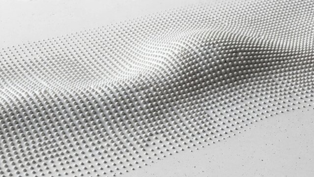 Abstract digital wave pattern formed by a grid of small spheres on a