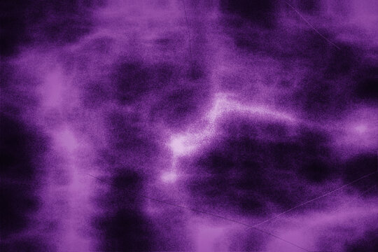Vibrant purple grunge texture features electric violet glow effects with subtle scratches suitable for energetic backgrounds and modern artistic layouts.