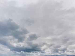 Obraz premium Dark Storm Clouds Gathering in Overcast Gray Sky