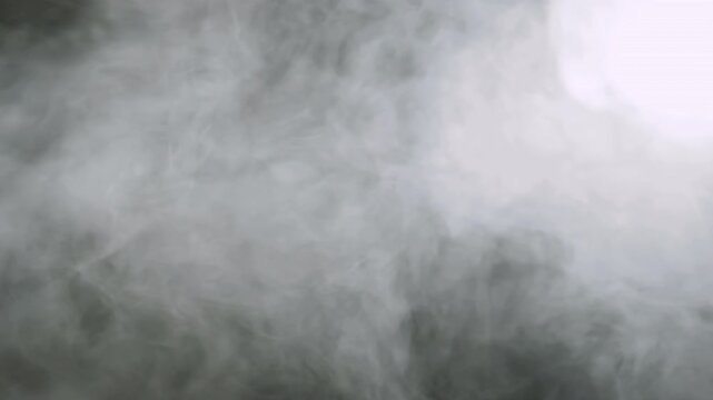 Thick white smoke swirling gray background. Abstract fog cloud overlay texture.