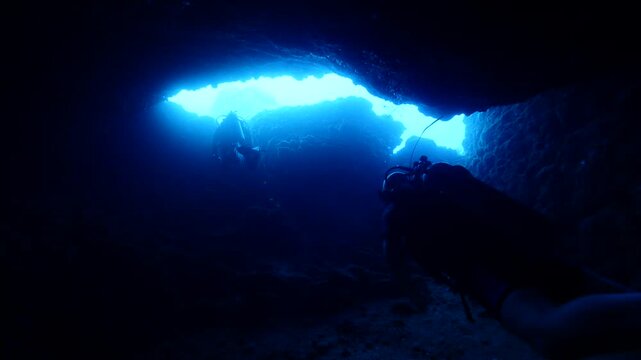 cave diving underwater  ocean scenery sun beams and rays background