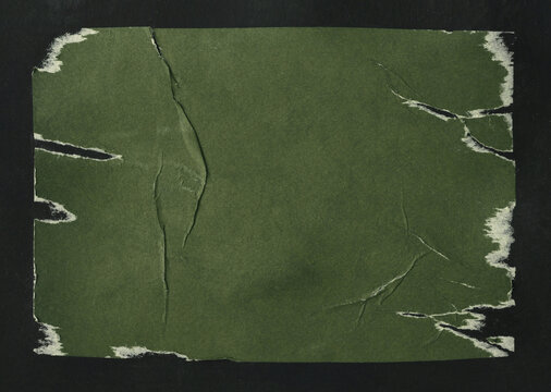 Brown earthy green Crumble ragged wrinkled paper pieces patch collage. Art Poster wall. Abstract grunge dirty texture black background.