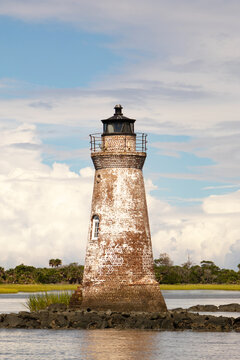 Old, weathered, abandoned, brick lighthouse
