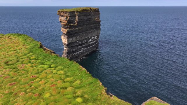 Downpatrick Head in Ireland at Sunny Day, Aerial Drone Shot. Stunning High Cliffs, Dun Briste Irish Coastal Landmark.