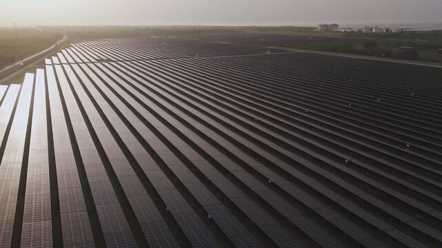 Renewable energy transition, industrial-scale solar power generation, green utility grid, and clean technology concept